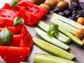 Fresh vegetables tomatoes, cucumber and olives for turkish breakfast